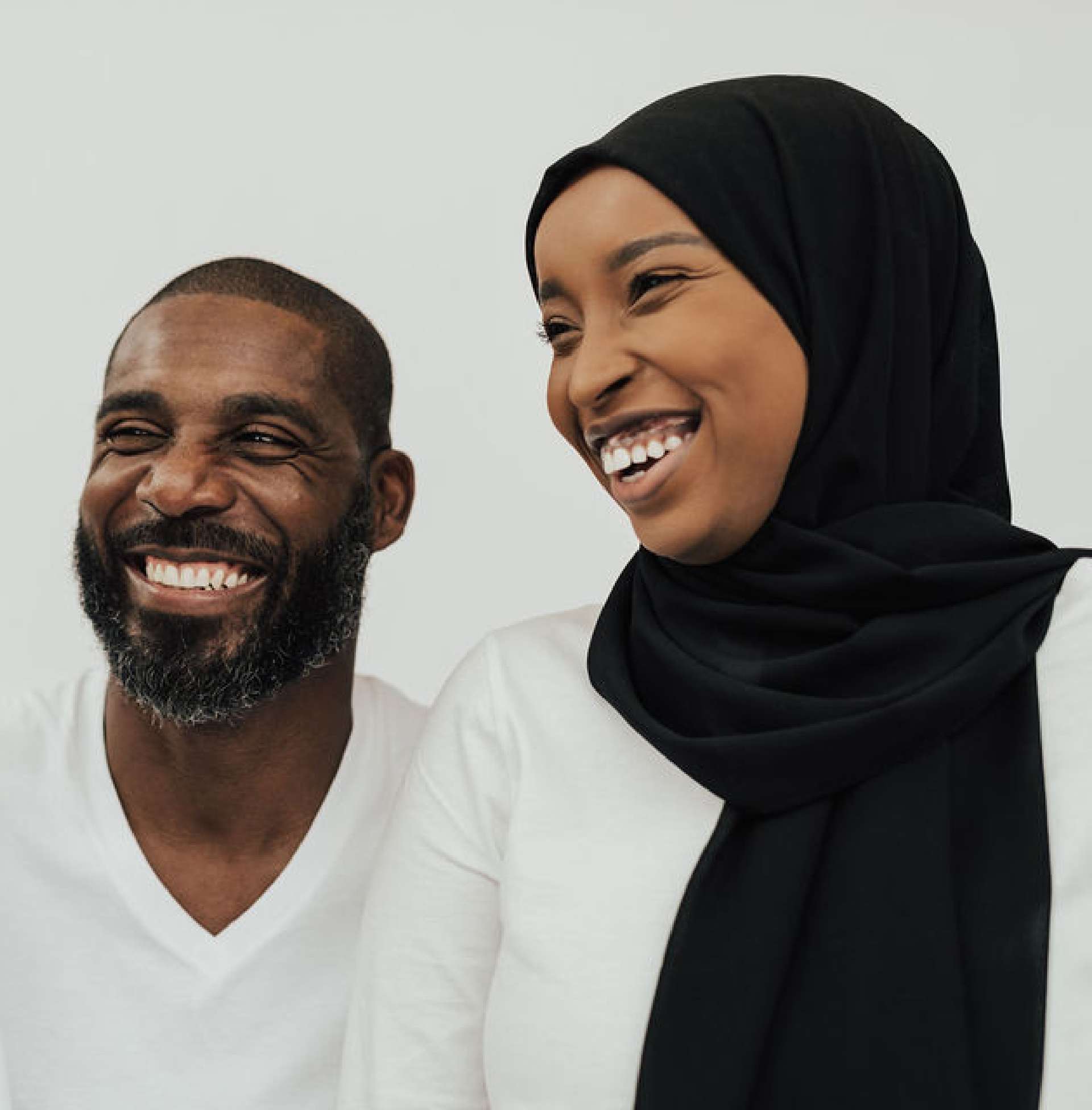 a man and woman laughing together