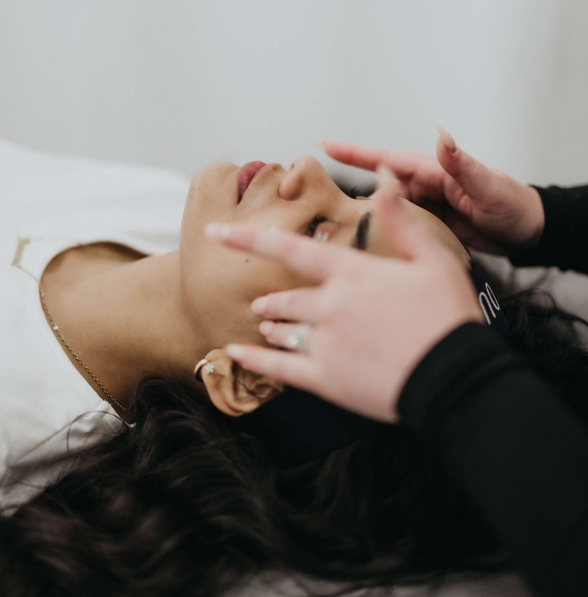 woman receiving a face massage